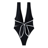 Traje de baño de una pieza con cuello en V, sin mangas, anudado y en contraste